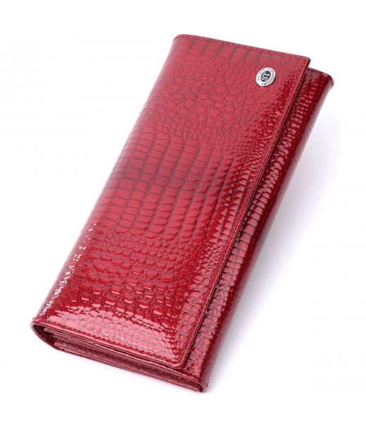 Лакований жіночий гаманець з фактурою під рептилію з натуральної шкіри ST Leather 22717 Червоний Лакований жіночий гаманець з фактурою під рептилію з натуральної шкіри ST Leather 22717 Червоний